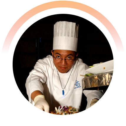 Chef plating a dish